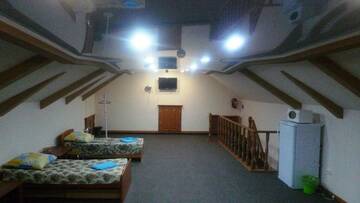 Кровать в 5-местном общем номере в Гостинице Сибирячка